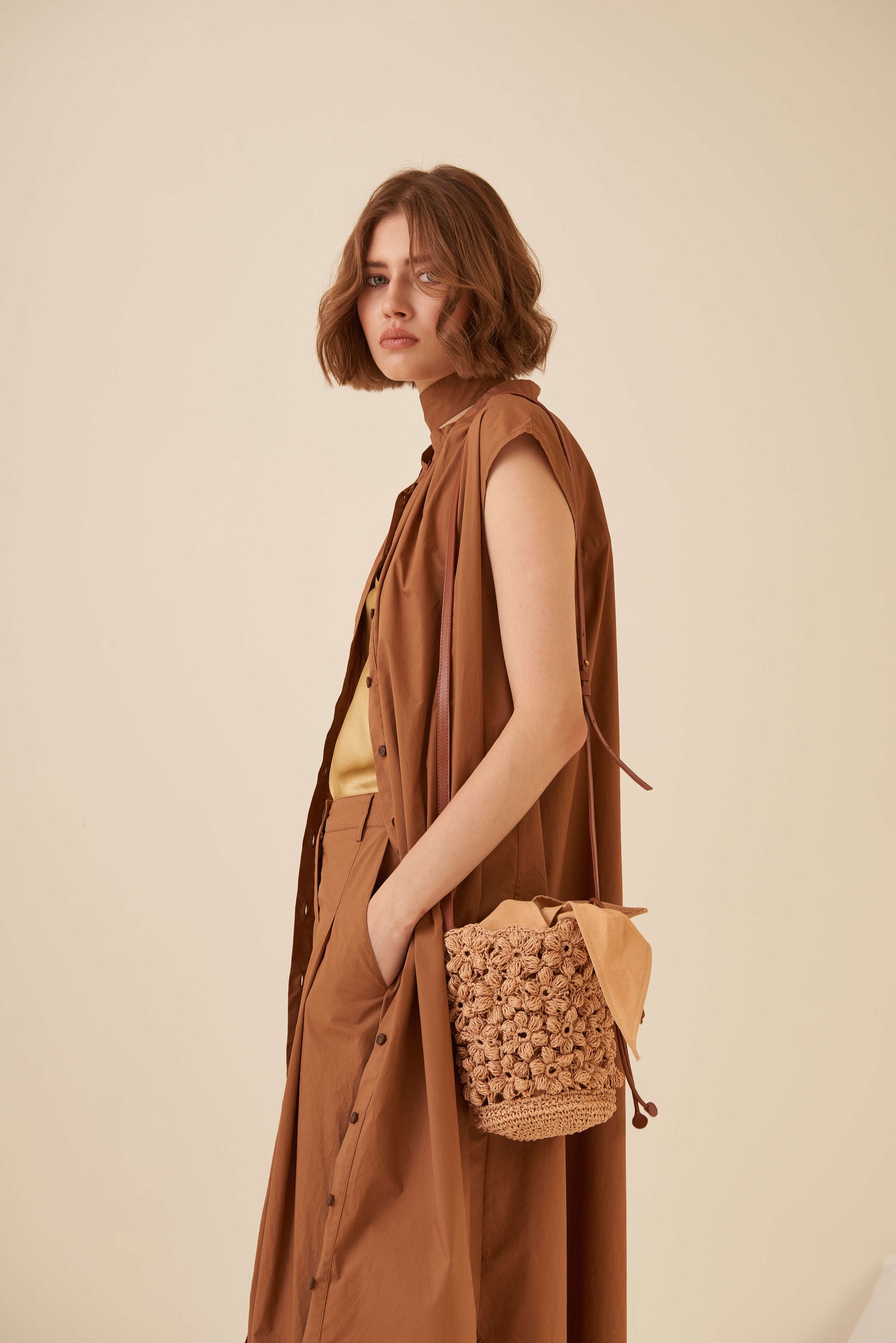 Abito abbottonato senza maniche