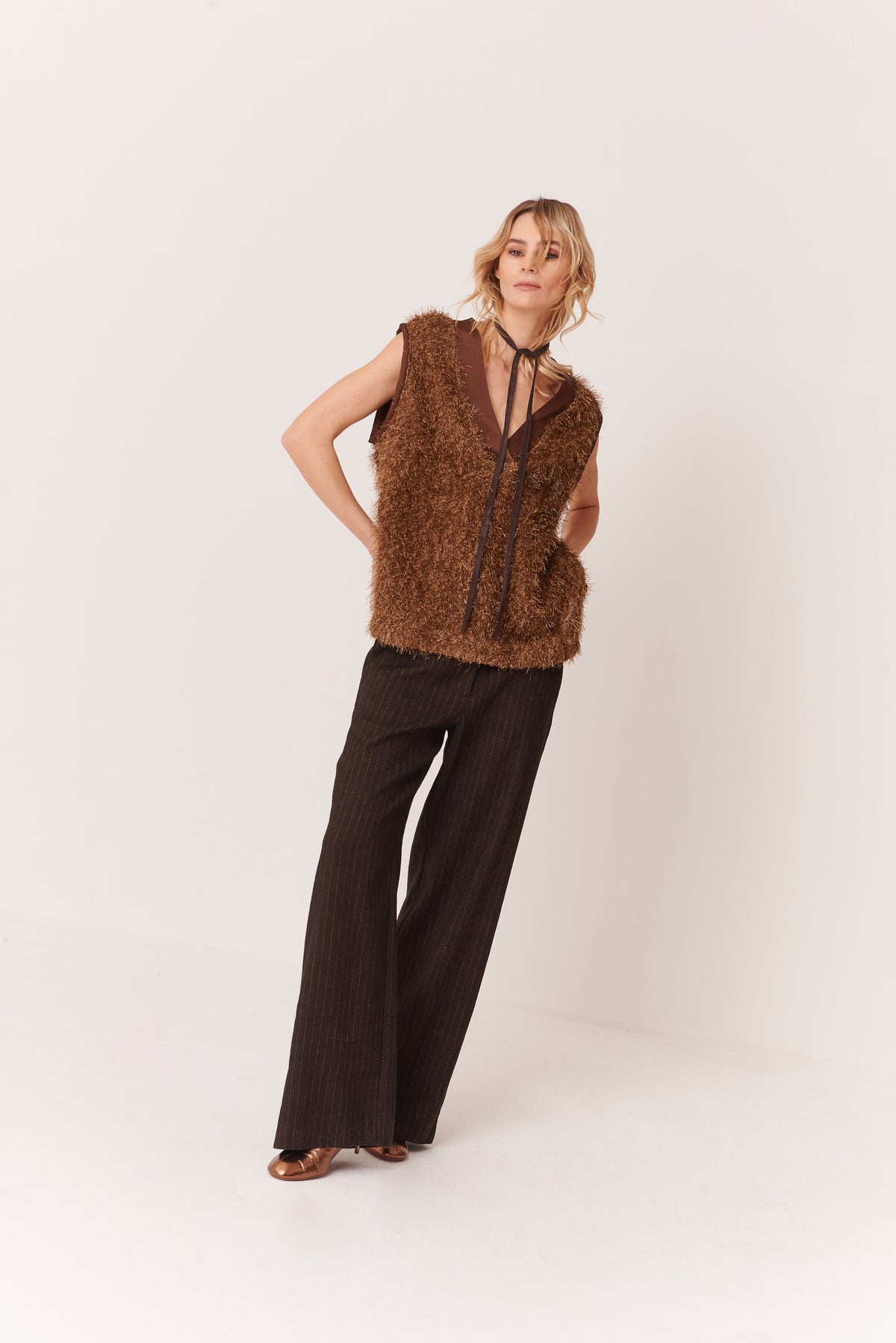 Gilet con profili di raso imbottiti in Bouclè Lurex