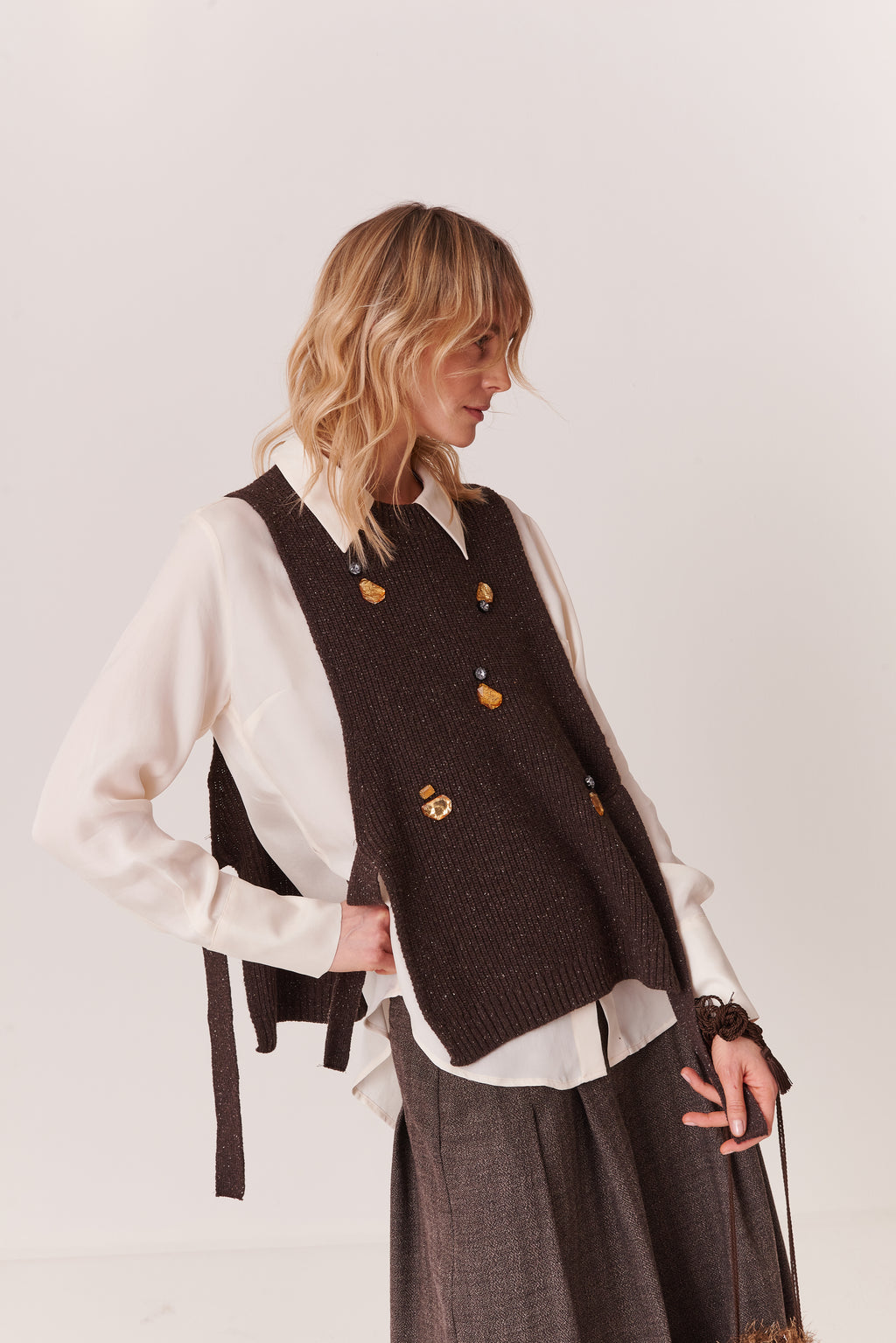Gilet melange a coste con applicazioni